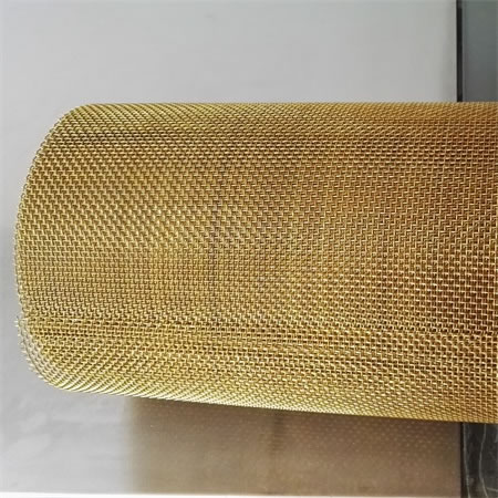 A roll of brass wire mesh with medium hole size.